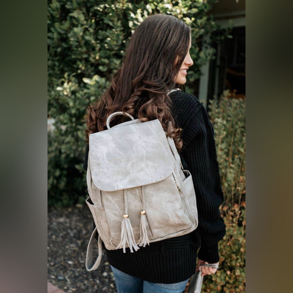 Avery backpack clutch